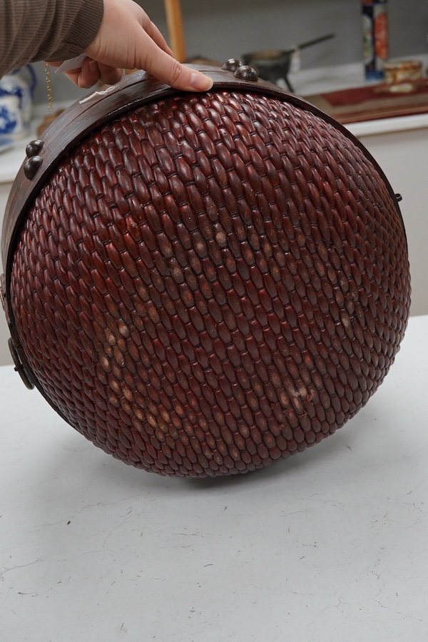 A Chinese circular red stained food box, 35.5cm diameter. Condition - good